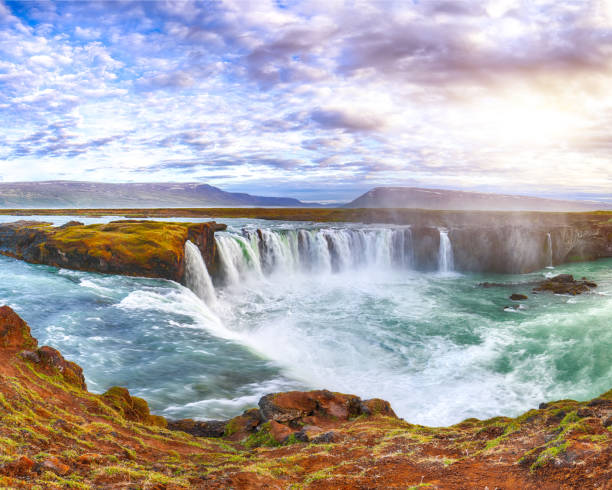 istock Dramatic sunset view of fantastic waterfall in Iceland 1188087245