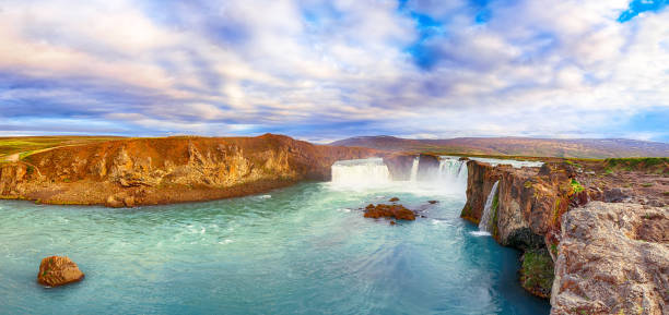 istock Dramatic sunset view of fantastic waterfall in Iceland 1188087267