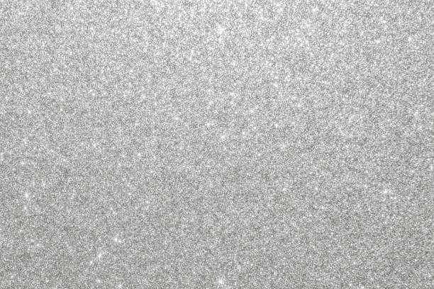 istock Silver glitter background texture white sparkling shiny wrapping paper for Christmas holiday seasonal wallpaper decoration, greeting and wedding invitation card design element 1188089076