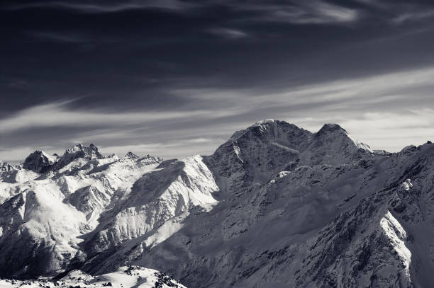 istock High snowy mountains at winter evening 1188089211