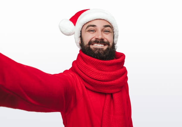 istock Cheerful hipster taking Christmas selfie 1188089279