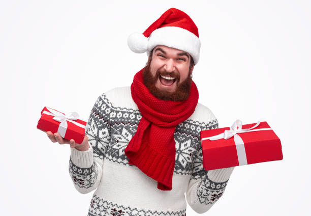 istock Excited man with Christmas gift boxes 1188089364