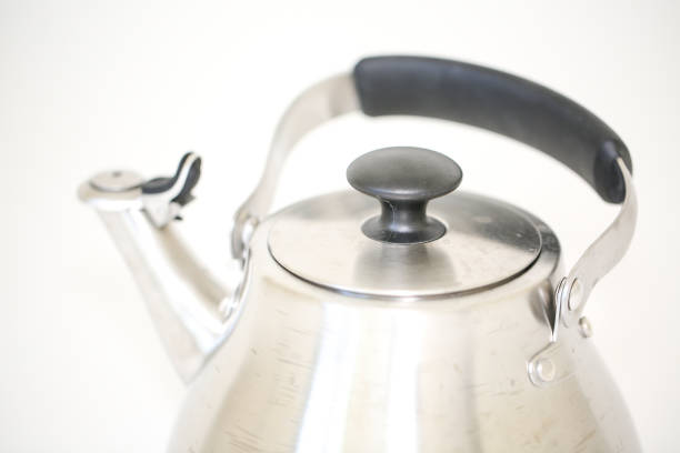 istock large tea pot kettle stove top isolated 1188089501
