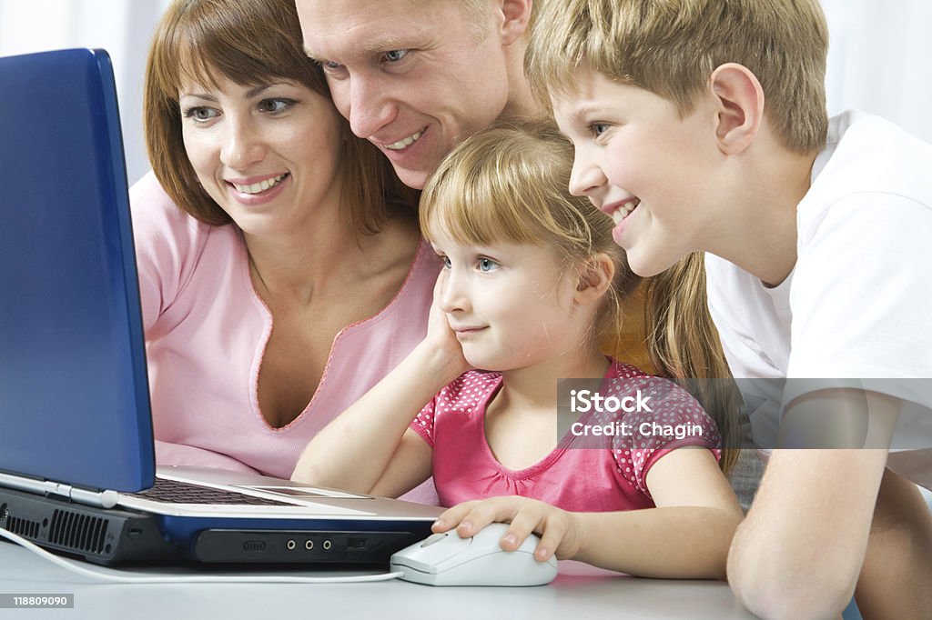 Family with the laptop  20-29 Years Stock Photo