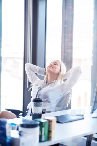 istock Happy young business women relaxing and geting insiration while working on desktop computer at modern bright starup office interior 1188094326