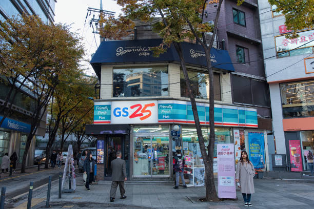 Seoul, Korea - November 16th, 2019 :  Its the convenience store, GS25 on the Deoksugung Stonewall Walkway in Seoul Korea. 서울 덕수궁 돌담길