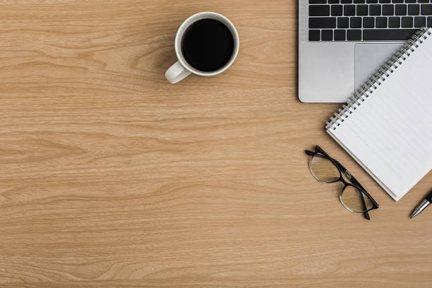 istock Top view Wood office desk table. Flat lay Workspace 1188115896