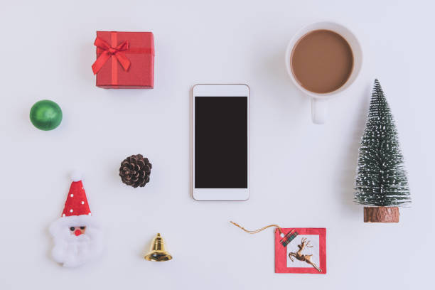 istock Empty screen smartphone with christmas ornament and copy space, Top view 1188116079