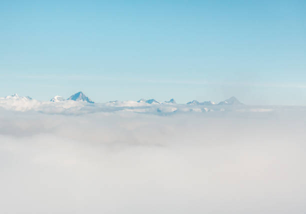 Mountain peak covered in thik fog in Saas-Fee, Switzerland.