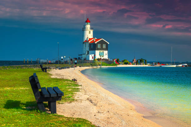 istock Old spectacular lighthouse on the seashore, Marken, Netherlands, Europe 1188144948