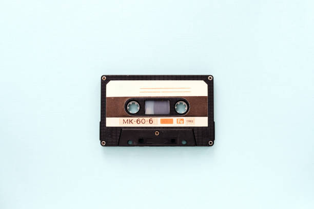 istock Audio tape cassette on a light blue background close-up. Top view 1188145184