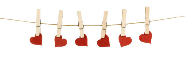 istock Clothes pegs and hearts 1188153638