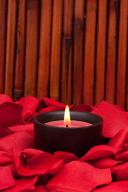 istock Candle and rose petals 118815727