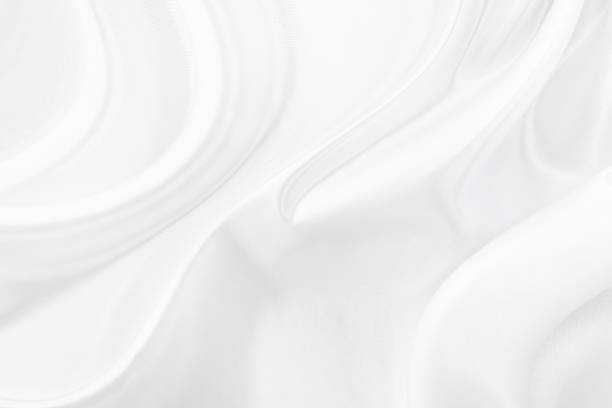 istock White gray satin texture that is white silver fabric silk background with beautiful soft blur pattern natural. 1188162282