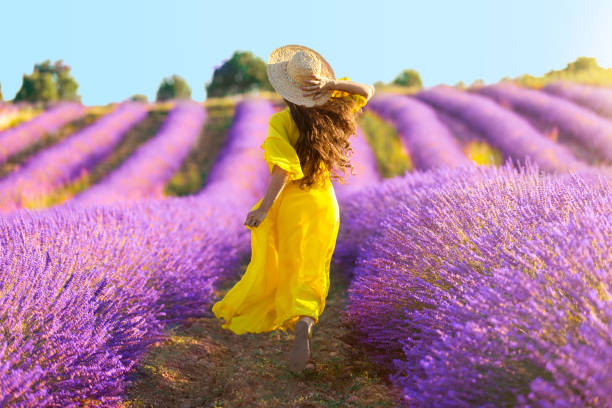 istock Woman running on lavender field 1188162755