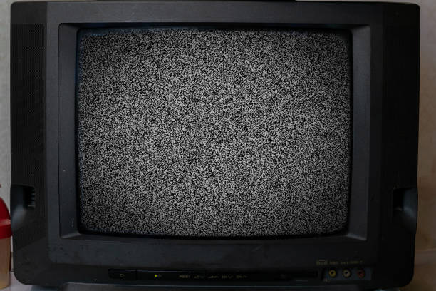 istock old vintage tv with noise texture at home 1188167470