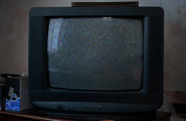 istock old vintage tv with noise texture at home 1188167484