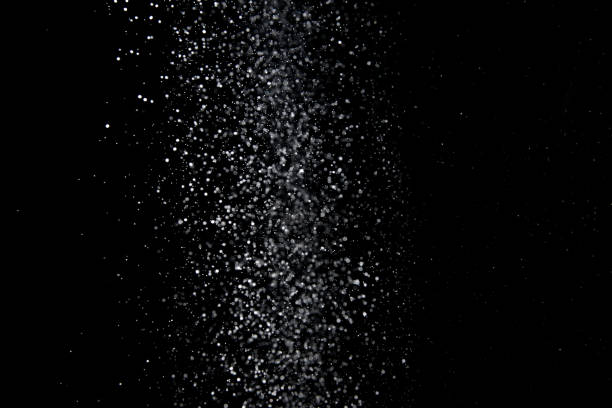 istock Realistic falling snowflakes. Isolated on black background. 1188168518