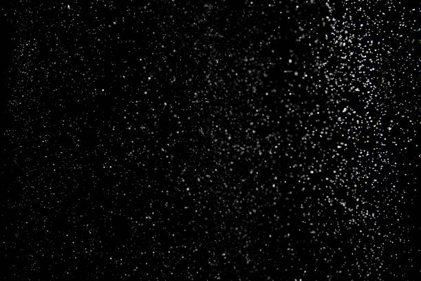 istock Realistic falling snowflakes. Isolated on black background. 1188168528