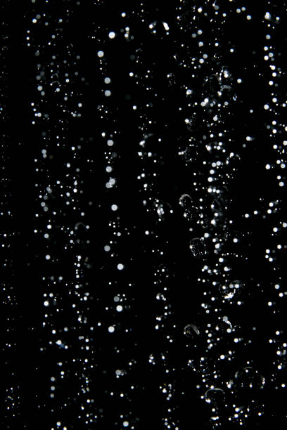 istock abstract splashes of water on a black background 1188168630