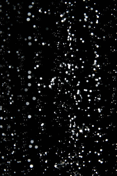 istock abstract splashes of water on a black background 1188168631