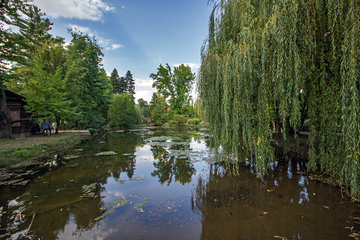 Sofia, Bulgaria - September 17, 2017: Lake at park Vrana - around former Royal Palace in city of Sofia, Bulgaria