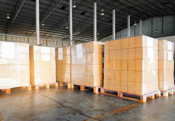 istock Stacked of package boxes wrapping plastic on wooden pallets 1188174291