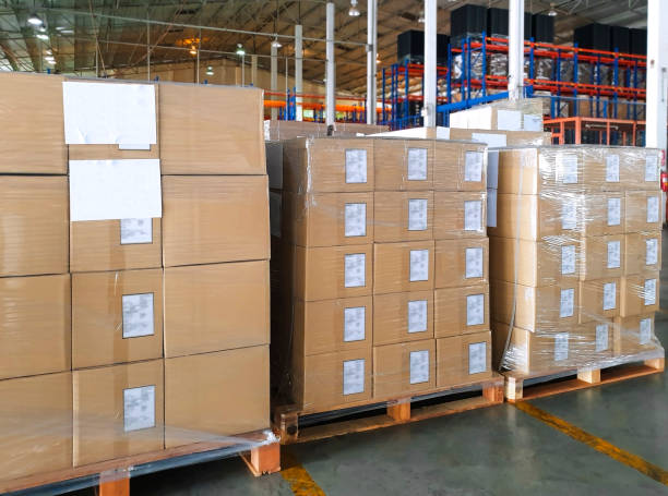 istock Stacked of package boxes wrapping plastic on wooden pallets 1188174501