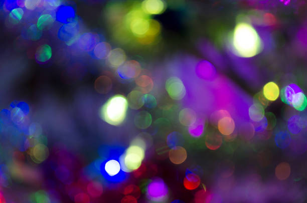 istock Christmas background with light spots and bokeh. Abstract background. Night background with bright lights 1188174555