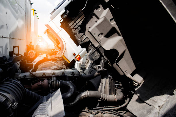 istock Trucks an opening the engine for repairing and maintenance. 1188174837