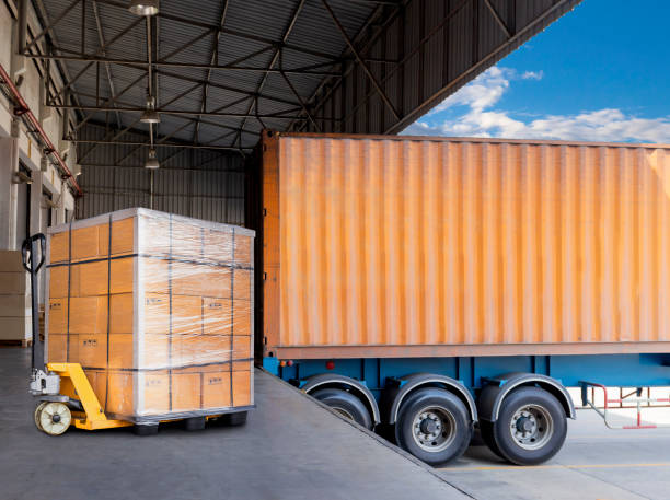 istock The truck container docking load shipment cargo at warehouse. 1188174855