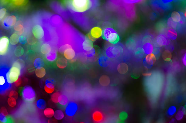 istock Christmas background with light spots and bokeh. Abstract background. Night background with bright lights 1188175683