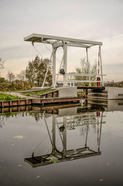 istock White drawbridge in lake area 1188176559