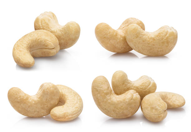 istock Collection of cashew nuts on white 1188176734