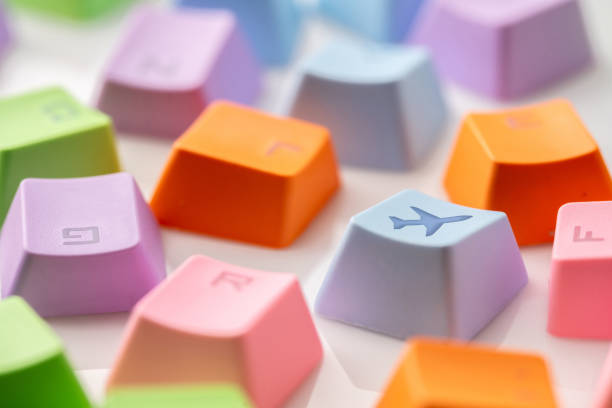 istock Colorful travel icon on computer keyboard for online booking concept 1188179769
