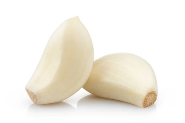 чеснок на белом - garlic freshness isolated vegetarian food стоковые фото и изображения