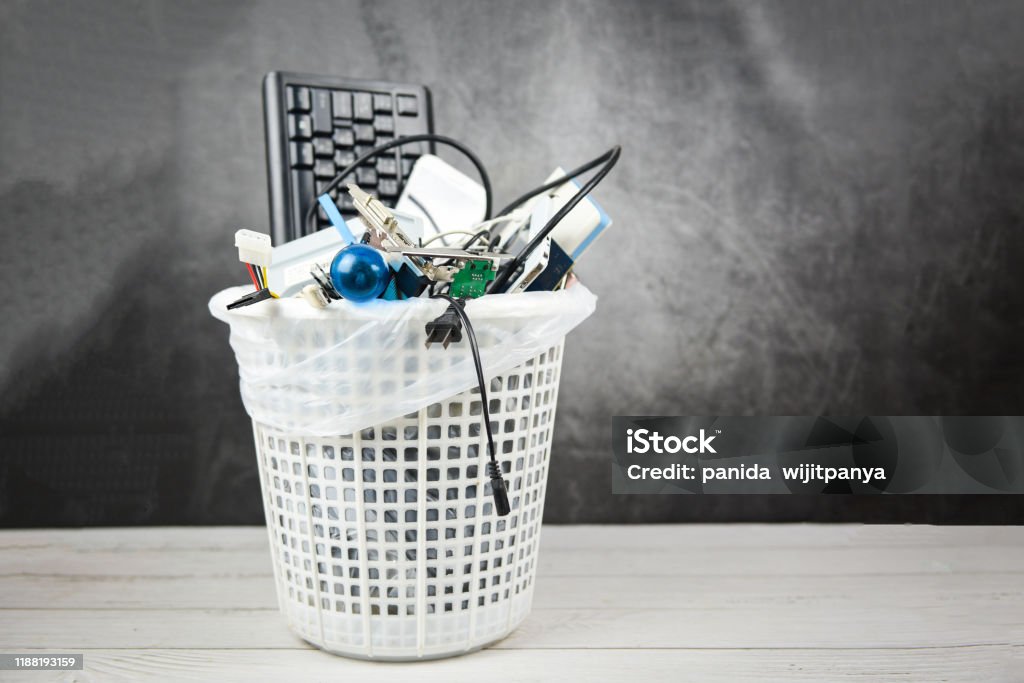 Electronics waste bin concept - Garbage electrical waste ready for recycling , Old devices E-waste disposal management reuse recycle and recovery Electronics waste bin concept / Garbage electrical waste ready for recycling , Old devices E-waste disposal management reuse recycle and recovery E-Waste Stock Photo
