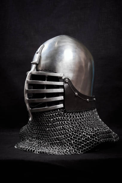 istock Knight helmet on a black background. Side view. 1188196259