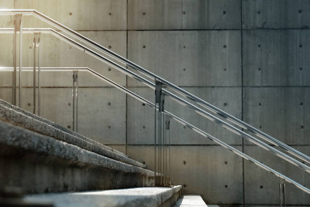 Empty Modern Cement Staircase in City with Morning Sun Light. Urban Background. Selective Focus, Side View