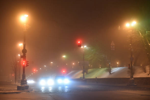 istock fog on night winter street 1188198024