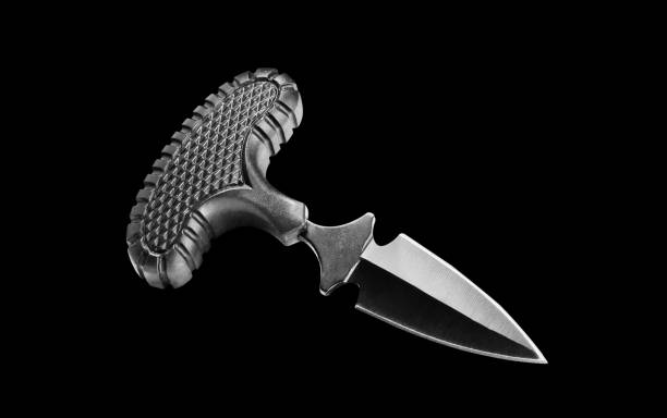 istock Beautiful shining knife on a black background. 1188202029