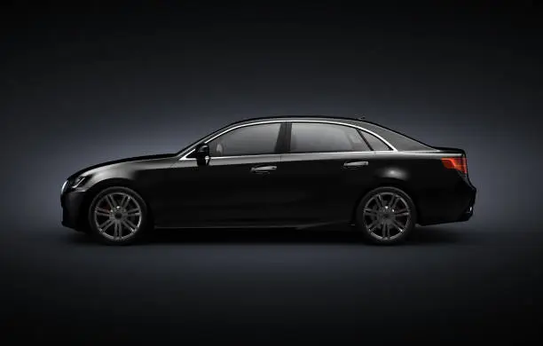 Photo of Black Generic sedan car  on black background - 3D illustration