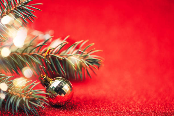 istock Yellow disco ball on red background close up. 1188206618