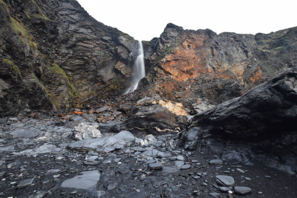 The waterfall at Pentargon Cove near Boscastle Cornwall stock photo