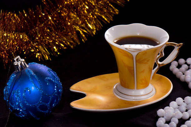 istock A cup of coffee on a dark background with Christmas decorations 1188207534