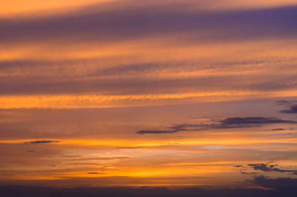 istock Abstract nature background. Dramatic sunset sky in the clouds saturated with bright colors of orange and yellow. 1188211456