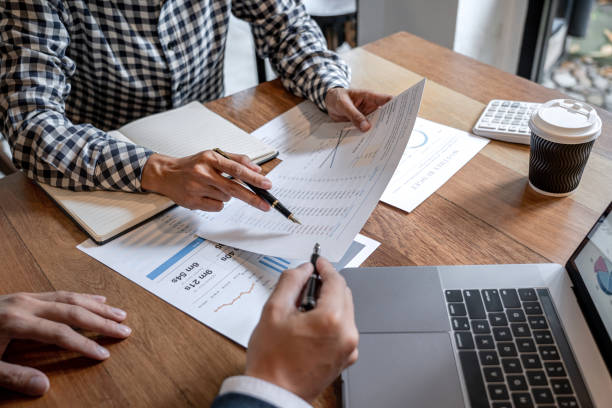 istock Business team collaboration discussing working analysis with financial data and marketing growth report graph in team to making growth profit, Partner meetings and briefing 1188211627