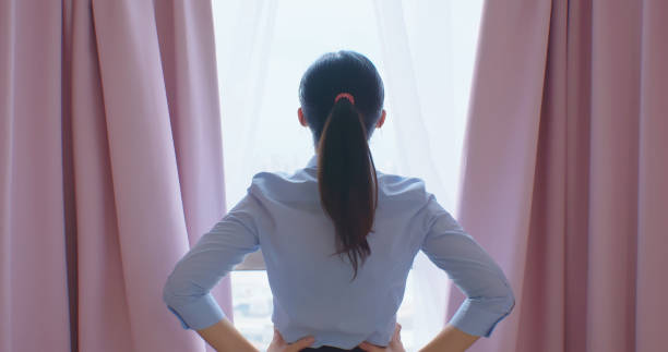 istock businesswoman look window out 1188213173