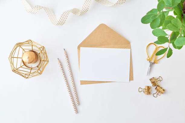 istock Mockup white greeting card and envelope with branches with green leaves on a light background 1188213367