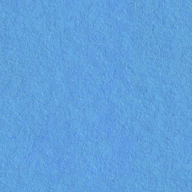istock Close-up shot of light blue paper texture. Tile ready. Seamless texture. 1188214286